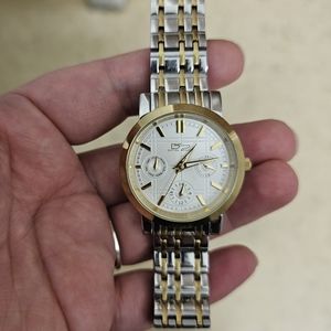 Daniel steiger silver and gold tone stainless steel watch